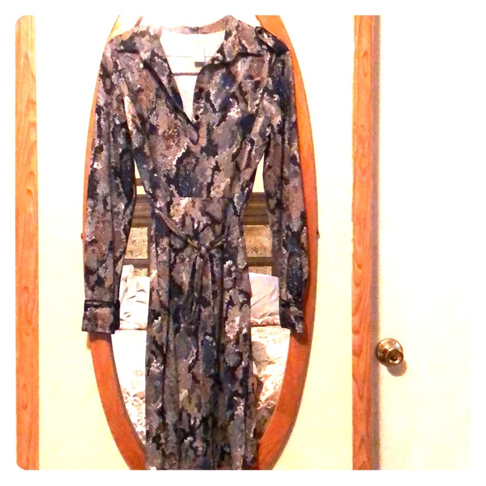 Adorable, small, long sleeve polyester dress.